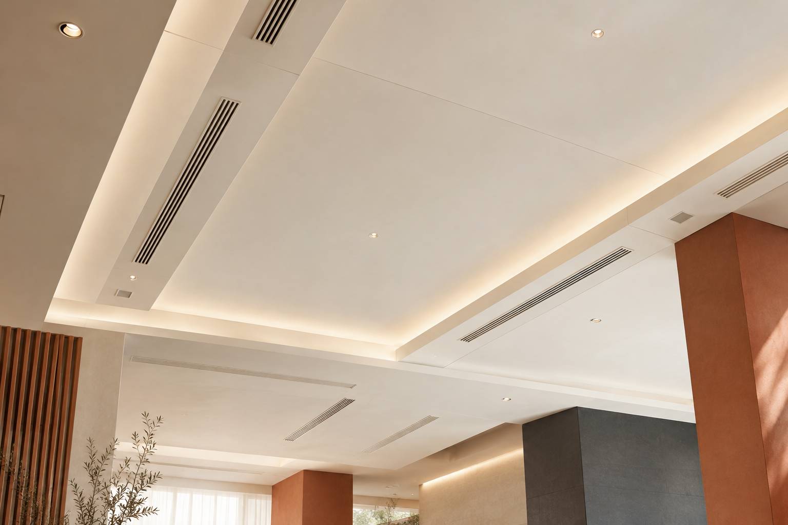 Bouches de soufflage discretes integrees dans un faux plafond